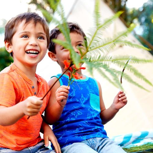 two-children-branches-flowers-39f50348-8150b1c4a22e409b8a2e0808e6c43a86